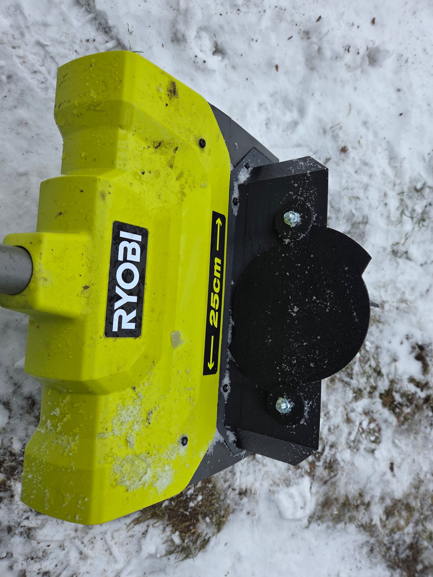 Justerbar udkast til sneslynge (Ryobi RY18ST25A)